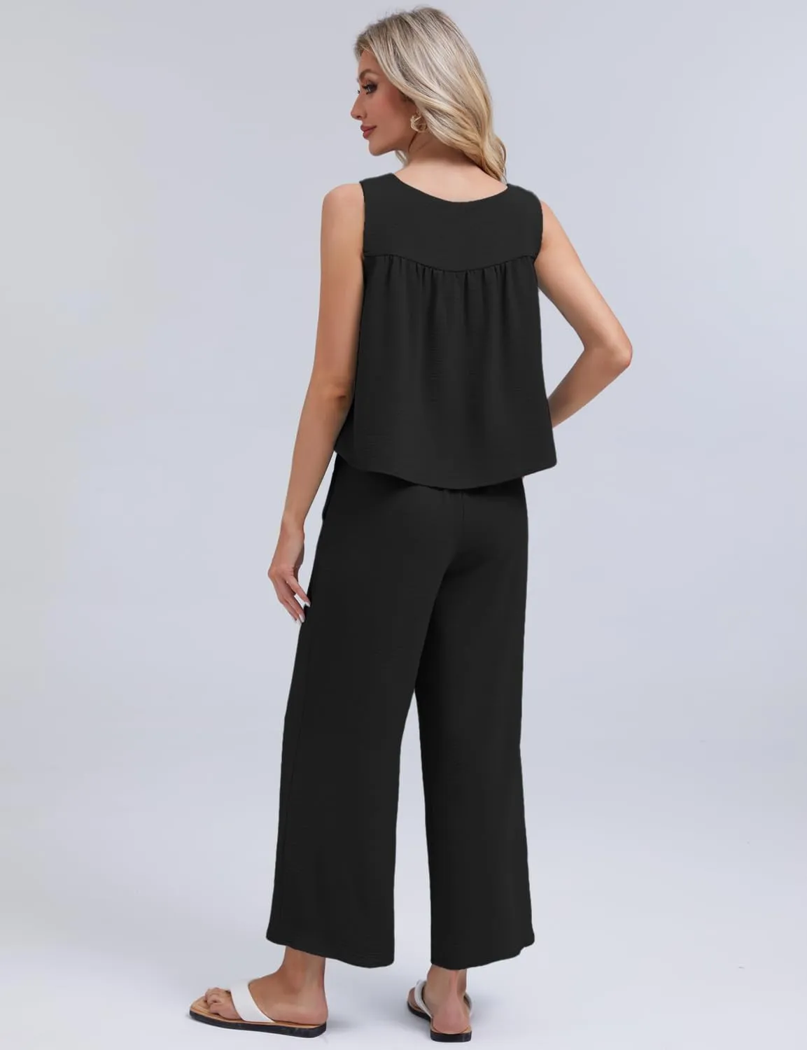 FANCYINN Women's Summer 2 Piece Outfits Peplum Ruffle Sleeveless Babydoll Tank Top Wide Leg Pants Set 2025 Tracksuit