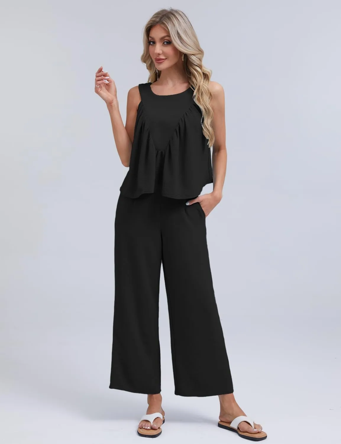 FANCYINN Women's Summer 2 Piece Outfits Peplum Ruffle Sleeveless Babydoll Tank Top Wide Leg Pants Set 2025 Tracksuit