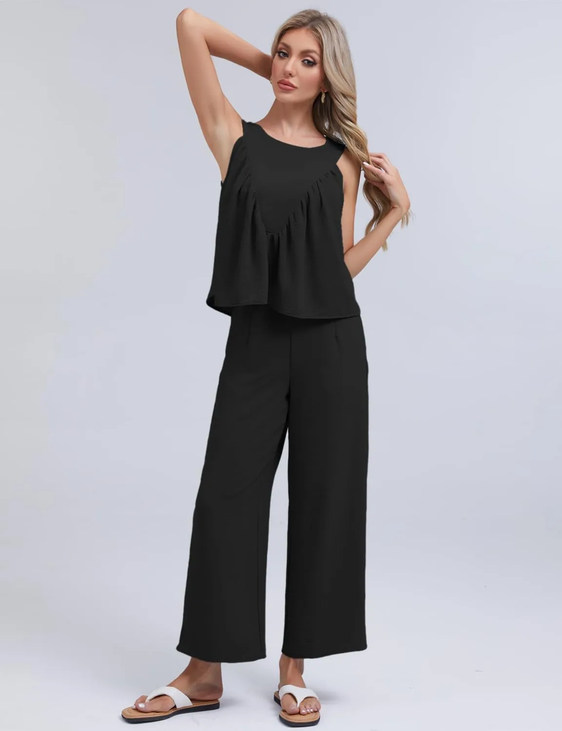 FANCYINN Women's Summer 2 Piece Outfits Peplum Ruffle Sleeveless Babydoll Tank Top Wide Leg Pants Set 2025 Tracksuit